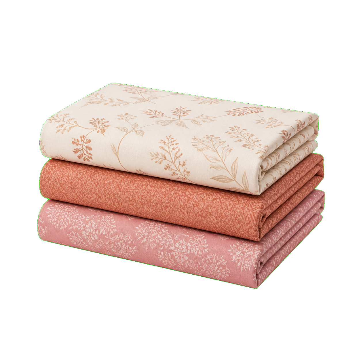 Three folded patterned bedsheets